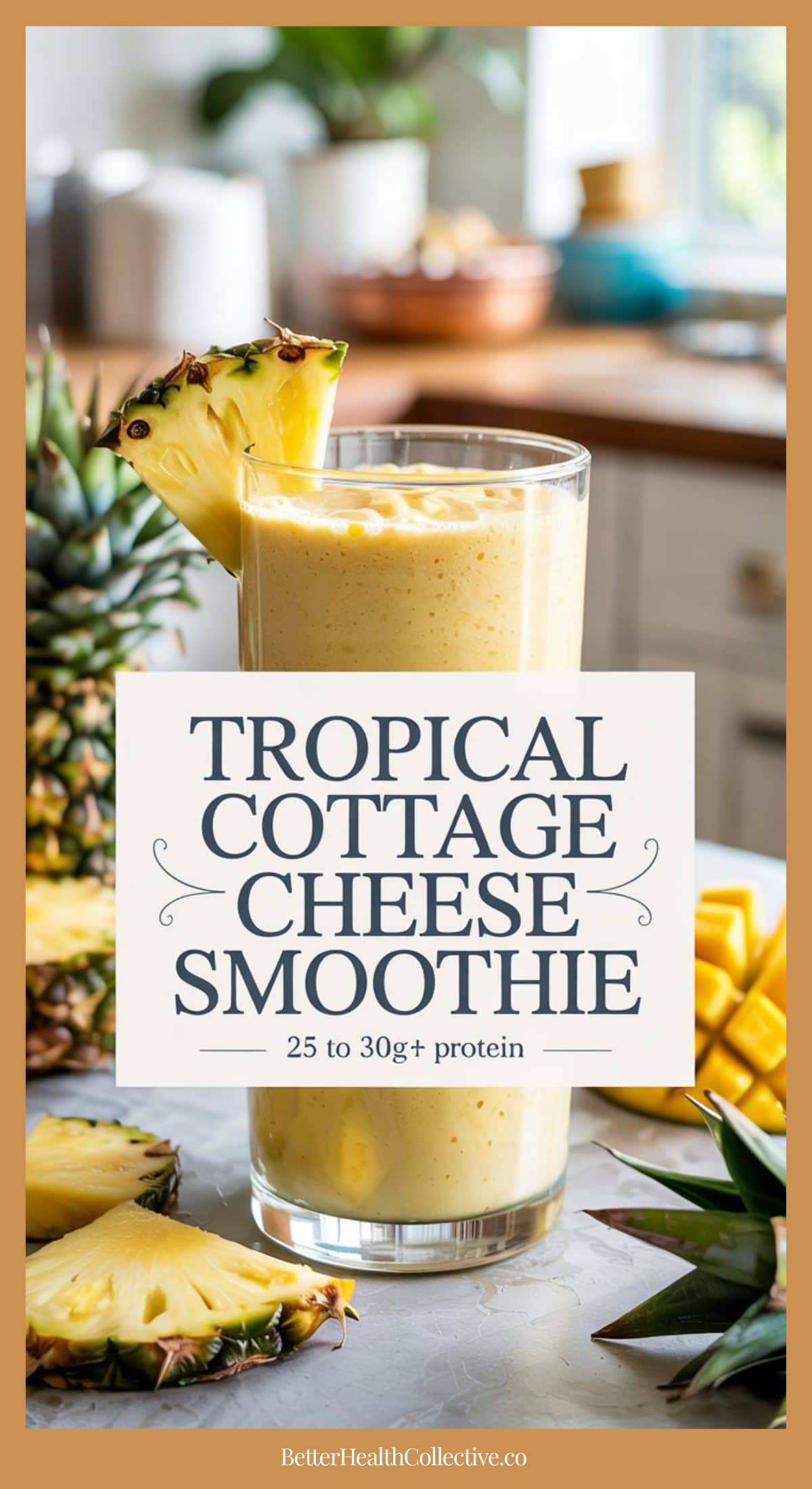 A tropical cottage cheese smoothie, garnished with pineapple, sits on a kitchen counter surrounded by fresh mango and pineapple. Text overlay reads: Tropical Cottage Cheese Smoothie - 25 to 30g+ protein.
