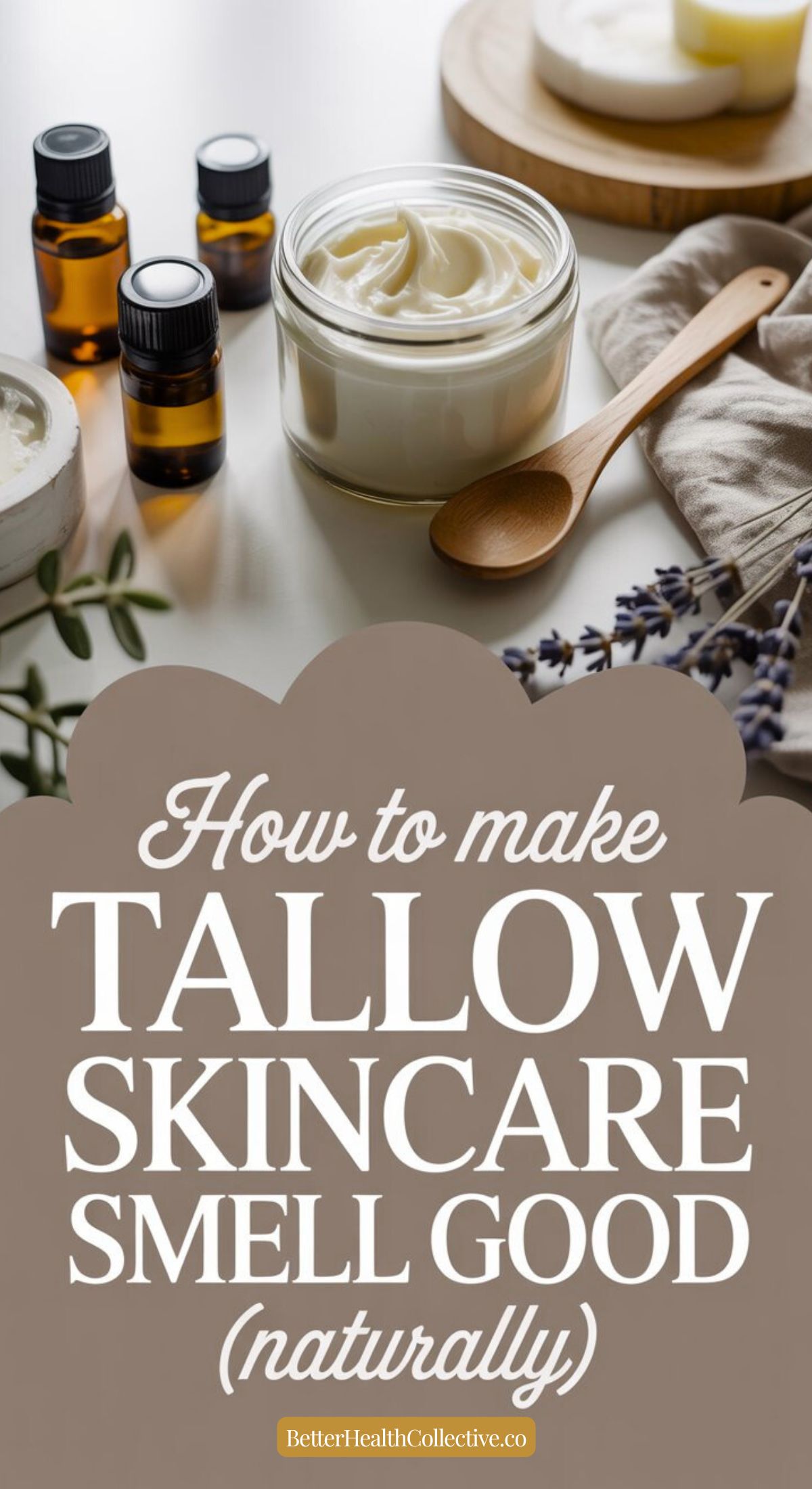 Jars of tallow skincare cream, amber essential oil bottles, a wooden spoon, and lavender sprigs on a table, with text overlay: How to make tallow skincare smell good using natural fragrance. wellnestguide.com.